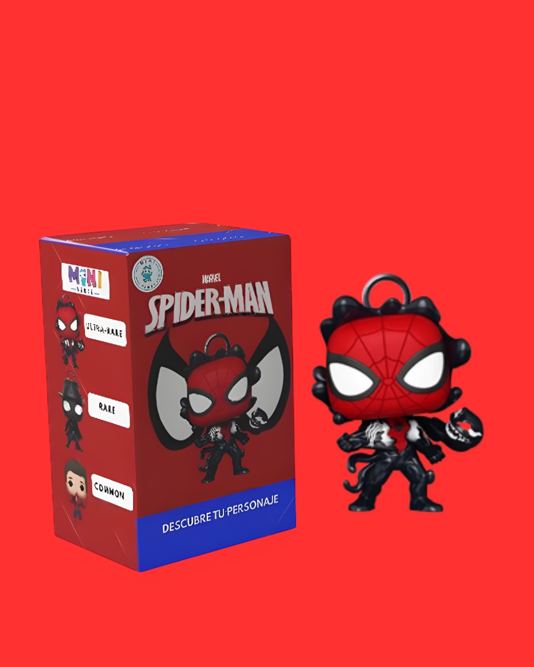 Caja sorpresa roja de Spider-Man junto a un llavero de Spider-Man Venomized